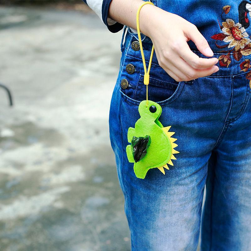 Pet Life ®Fleece Dinosaur Shaped Travel Waste Bag Dispenser with 2 Rolls - Image 2